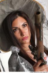 LUCI_AVIOL STANDING POSE WITH TWO GUNS 